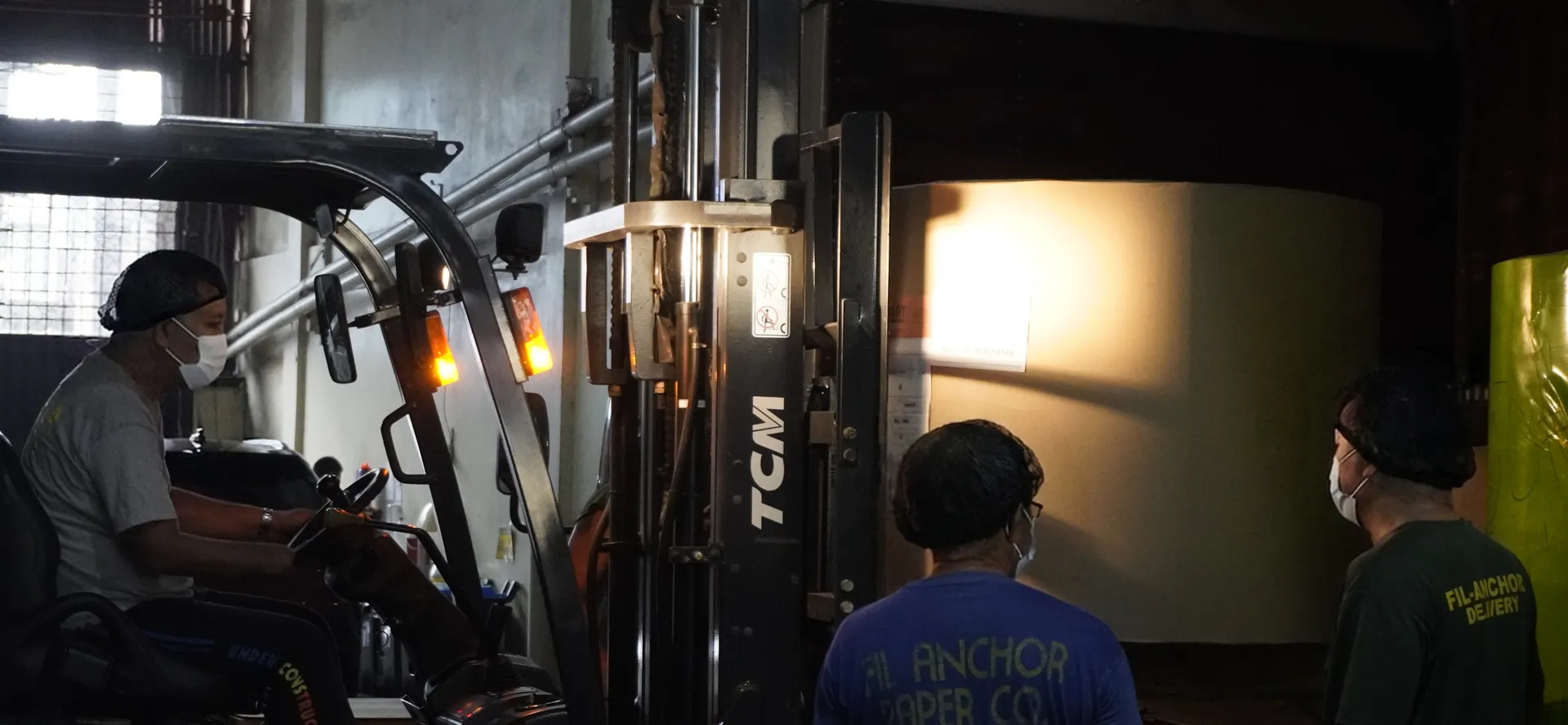 Fil-Anchor paper roll being loaded at the factory